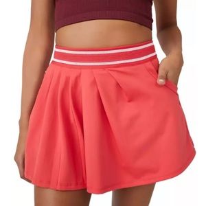 🆕 Free People Movement Round Robbin Tennis Skirt in Cayenne